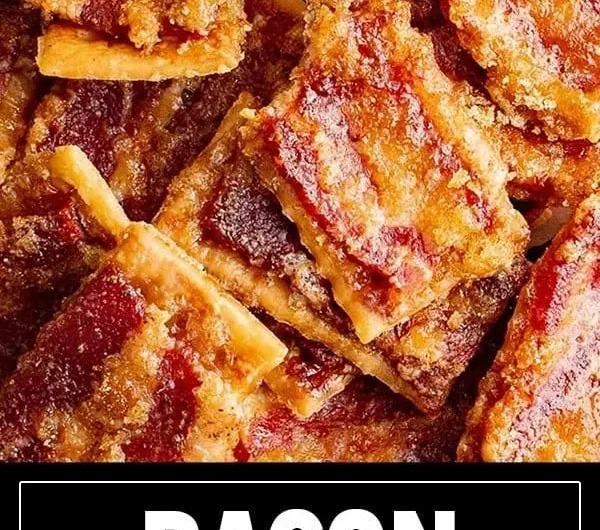 Delicious candied bacon crackers topped with sweet glaze on a serving platter