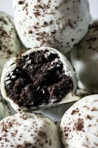 Delicious homemade Oreo Cake Balls on a decorative plate.