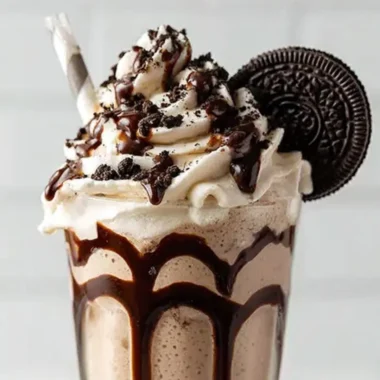 Delicious Bailey's Cookies and Cream Shake in a glass with cookie garnish