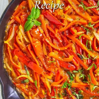 Delicious bowl of bell pepper stew with assorted vegetables and herbs
