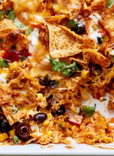Cheesy Dorito Veggie Casserole with colorful vegetables and crunchy toppings