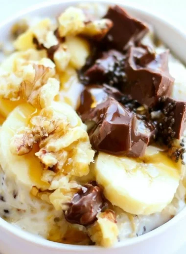 Chunky Monkey Overnight Oats with banana and chocolate in a bowl