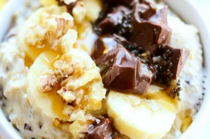 Chunky Monkey Overnight Oats with banana and chocolate in a bowl