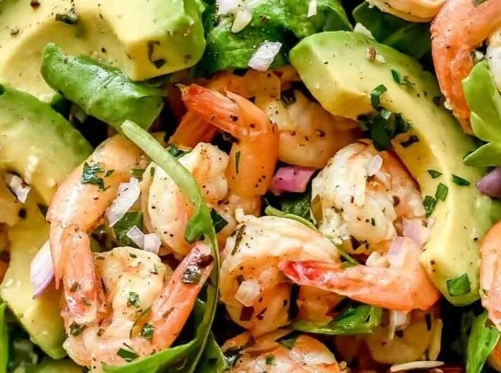 Citrus Shrimp and Avocado Salad beautifully arranged on a plate
