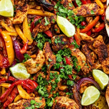 Cozy sheet pan chicken fajitas with colorful bell peppers and onions