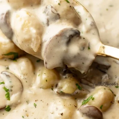 Boursin gnocchi topped with fresh herbs and cheese