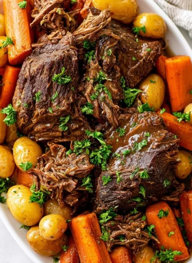 Tender Crock Pot pot roast with vegetables ready to serve