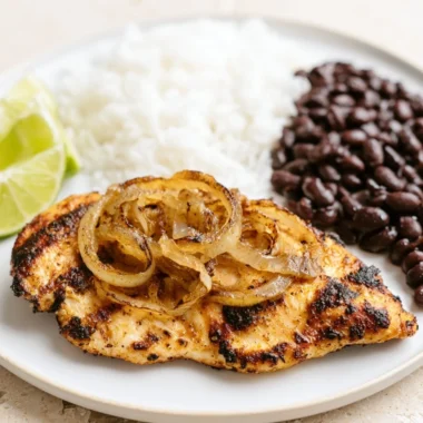 Delicious Cuban grilled chicken with spices and herbs on a plate