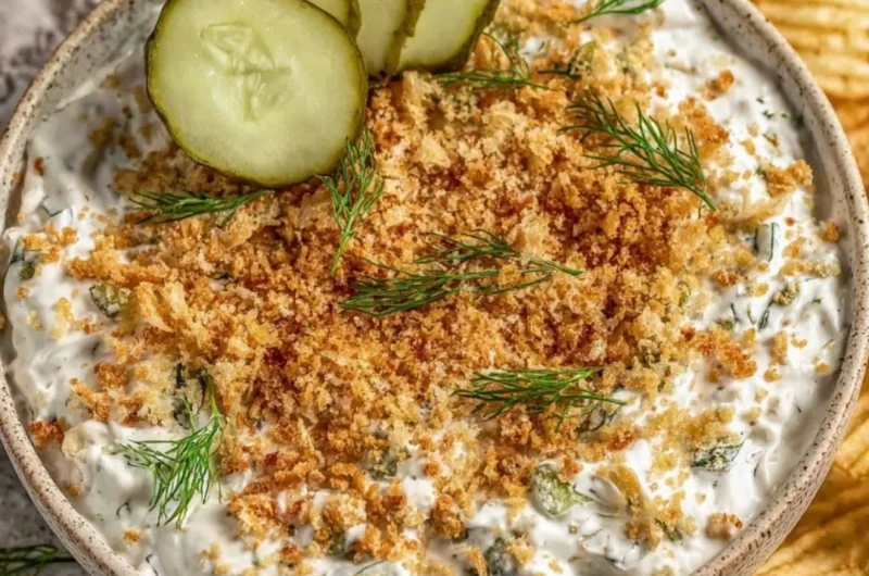 Creamy and savory easy fried pickle dip served in a bowl