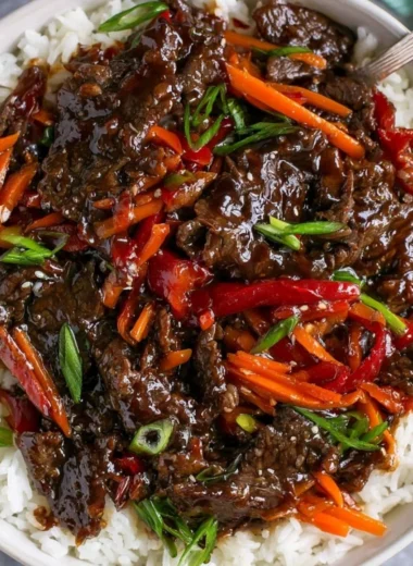 Easy Mongolian beef dish served with vegetables and rice.