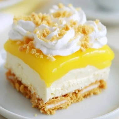 Heavenly Lemon Oreo Dessert topped with whipped cream and lemon zest