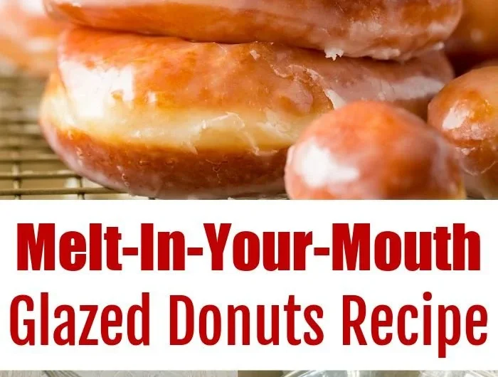 Plate of homemade glazed donuts with a shiny icing glaze.