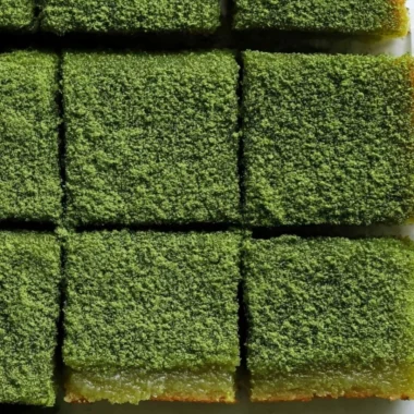Delicious matcha mochi brownies topped with green tea sprinkles