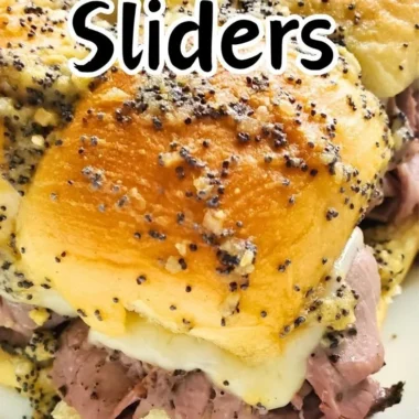 Plate of succulent roast beef sliders served with toppings