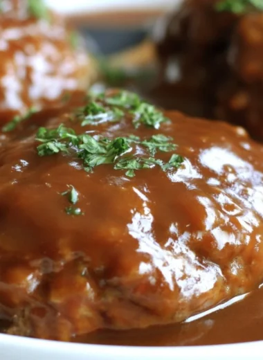 Delicious homemade Salisbury steak served with gravy and mashed potatoes