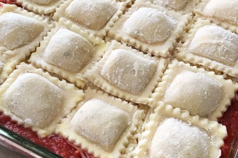 Cozy baked ravioli casserole with melted cheese and rich tomato sauce