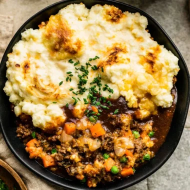 Delicious Shepherd's Pie with beef, veggies, and mashed potatoes in a cozy dish