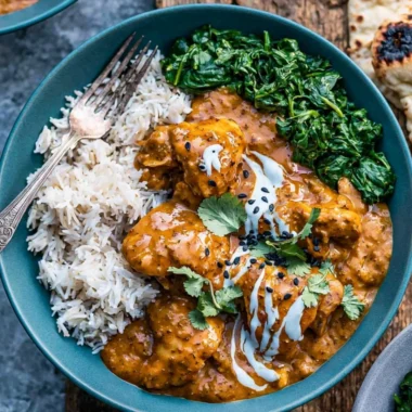 Cozy slow cooker chicken curry simmering with spices and vegetables in a pot.
