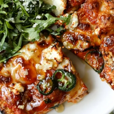 Hot Honey and Goat Cheese Pepperoni Pizza with a sweet and savory flavor profile.