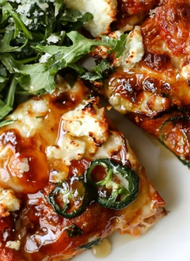 Hot Honey and Goat Cheese Pepperoni Pizza with a sweet and savory flavor profile.