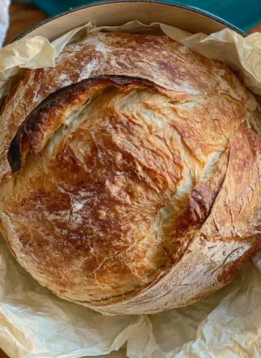 Homemade sourdough bread freshly baked on a wooden table