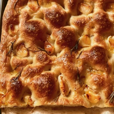 Delicious Sourdough Focaccia topped with herbs and olive oil