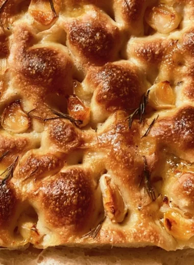 Delicious Sourdough Focaccia topped with herbs and olive oil