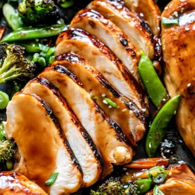 Cozy sheet pan teriyaki chicken recipe with colorful vegetables.
