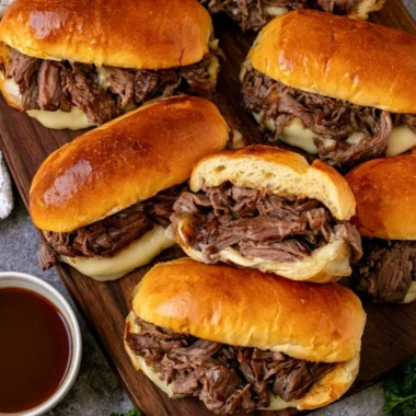 Cozy Crockpot French Dip Sandwiches with beef and melted cheese